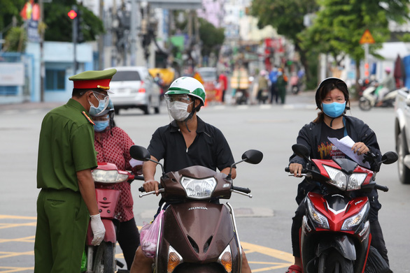 Sáng 6/9: Hà Nội chống dịch với biện pháp chưa từng có tiền lệ; người đã tiêm vaccine sẽ được ra đường - Ảnh 4.