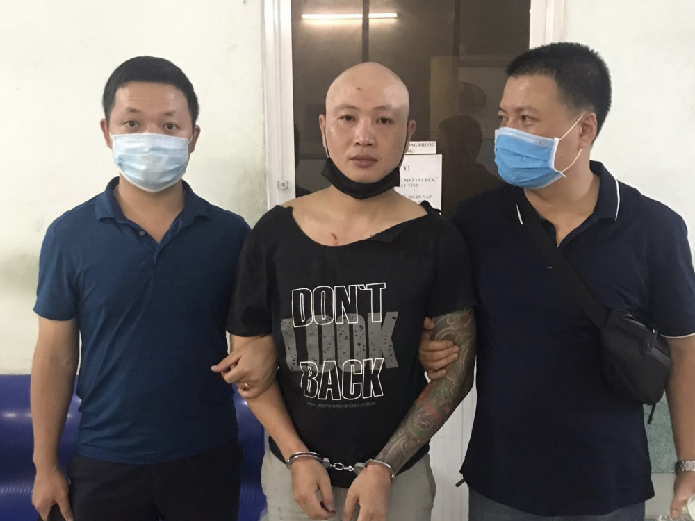 Nổ súng bắt kẻ giết người sau 11 năm trốn truy nã - Ảnh 1.