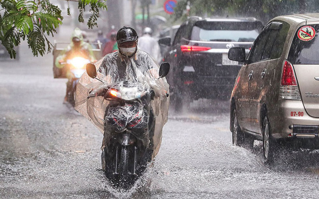 Thông tin mới nhất về không khí lạnh đang tràn xuống: Cảnh báo mưa lớn ở Bắc Bộ, Trung Bộ - Ảnh 1.