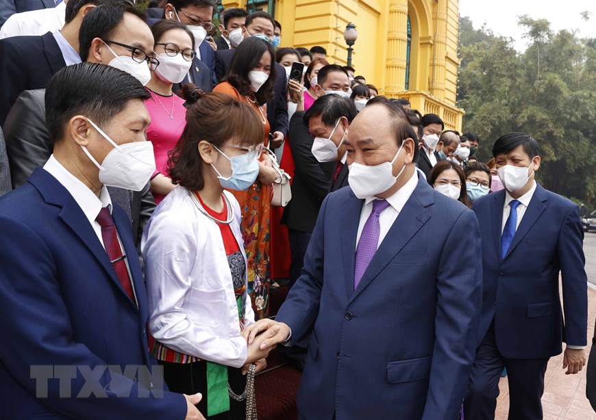 Chủ tịch nước Nguyễn Xuân Phúc gặp mặt cán bộ y tế tiêu biểu toàn quốc - Ảnh 2.