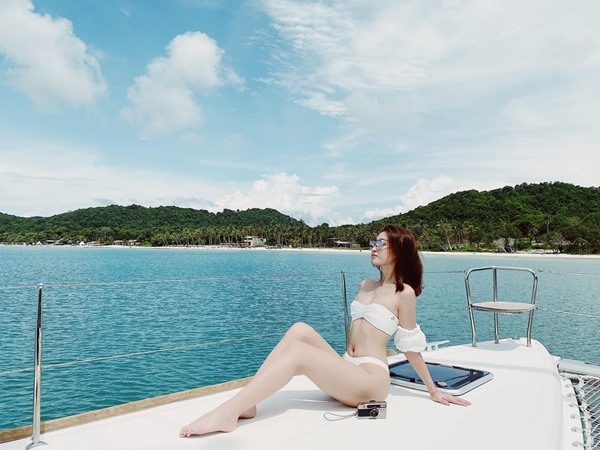 Hoa hậu Đỗ Mỹ Linh diện bikini gợi cảm, đẹp hút mắt - Ảnh 3.