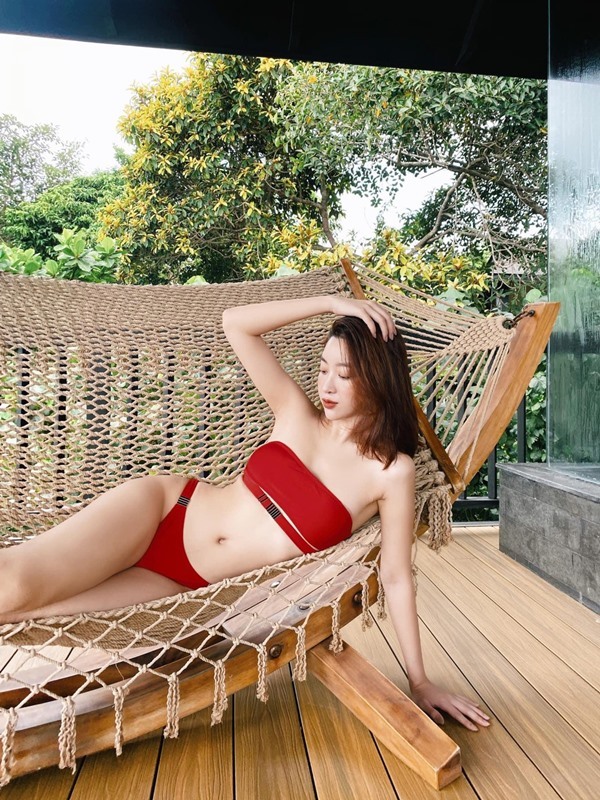 Hoa hậu Đỗ Mỹ Linh diện bikini gợi cảm, đẹp hút mắt - Ảnh 8.