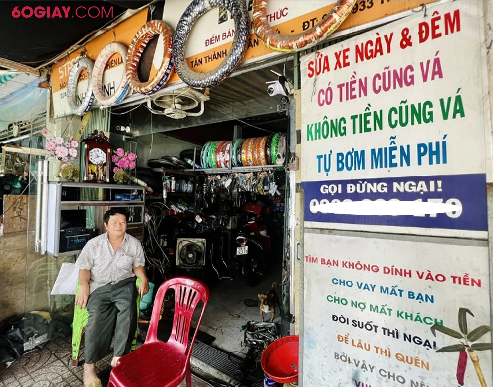 Chủ tiệm sửa xe không tiền cũng vá ở Sài Gòn: Đã làm việc này 6 năm nay, không dàn cảnh - Ảnh 1.