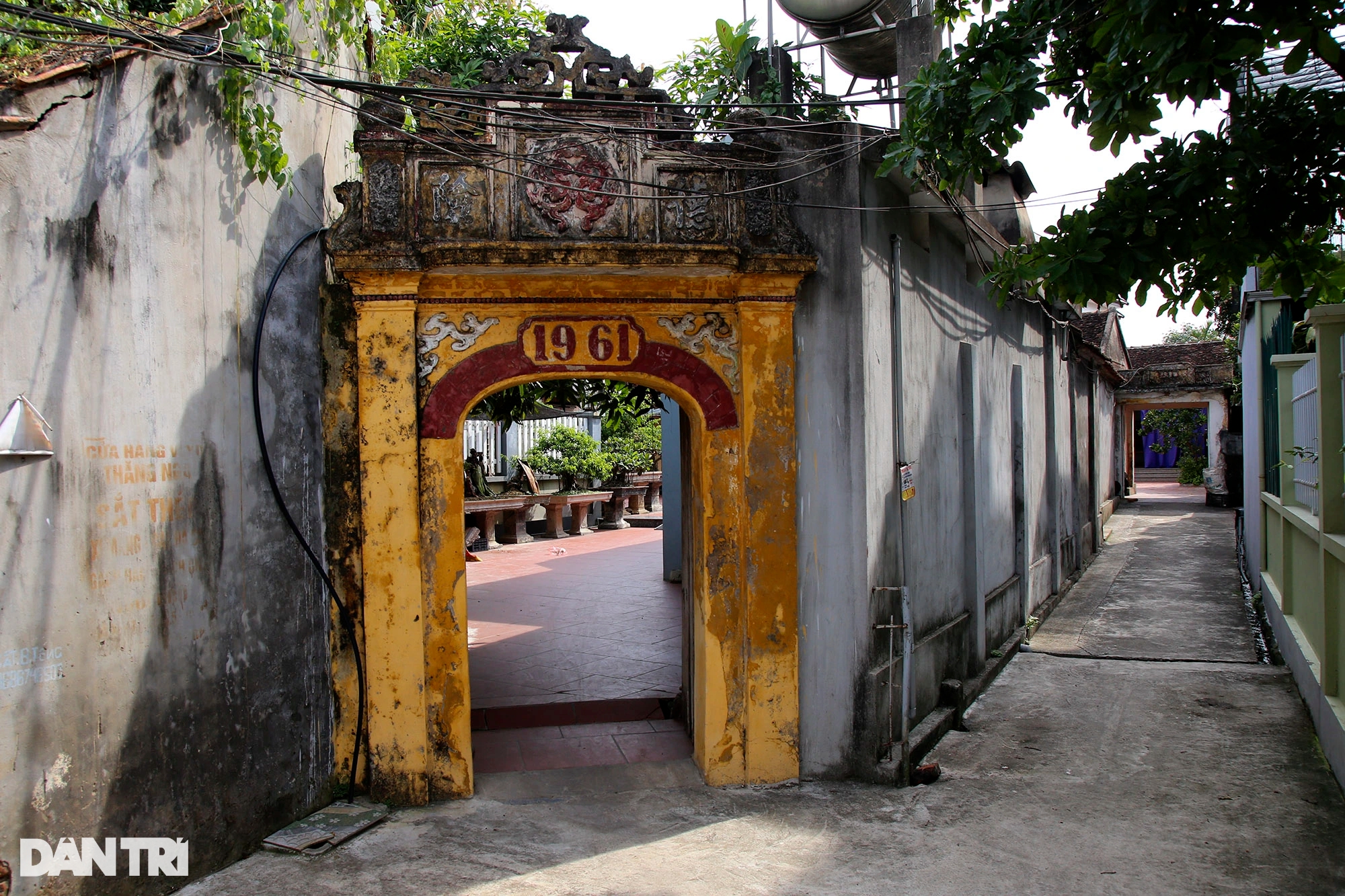 Những chiếc cổng trăm tuổi độc đẹp còn lại ở ngôi làng cổ tại Hà Nội - Ảnh 9.