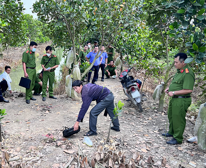 Thực nghiệm điều tra vụ giết người, cướp tài sản trong vườn mít - Ảnh 3.