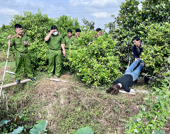 Thực nghiệm điều tra vụ giết người, cướp tài sản trong vườn mít - Ảnh 4.