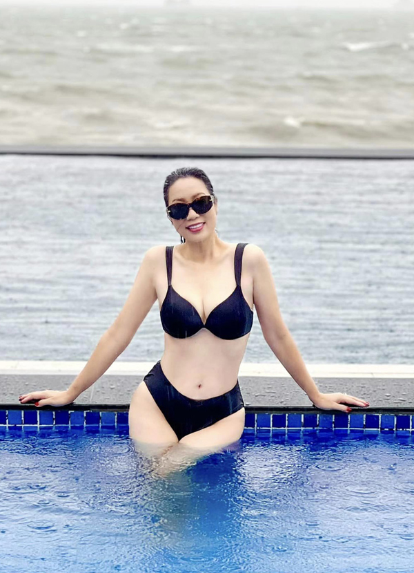 Tuổi 52, Á hậu Trịnh Kim Chi vẫn khoe bikini gợi cảm, vóc dáng thon thả nhờ một bí quyết cực đơn giản - Ảnh 7.