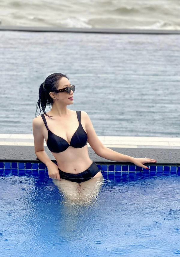 Tuổi 52, Á hậu Trịnh Kim Chi vẫn khoe bikini gợi cảm, vóc dáng thon thả nhờ một bí quyết cực đơn giản - Ảnh 8.