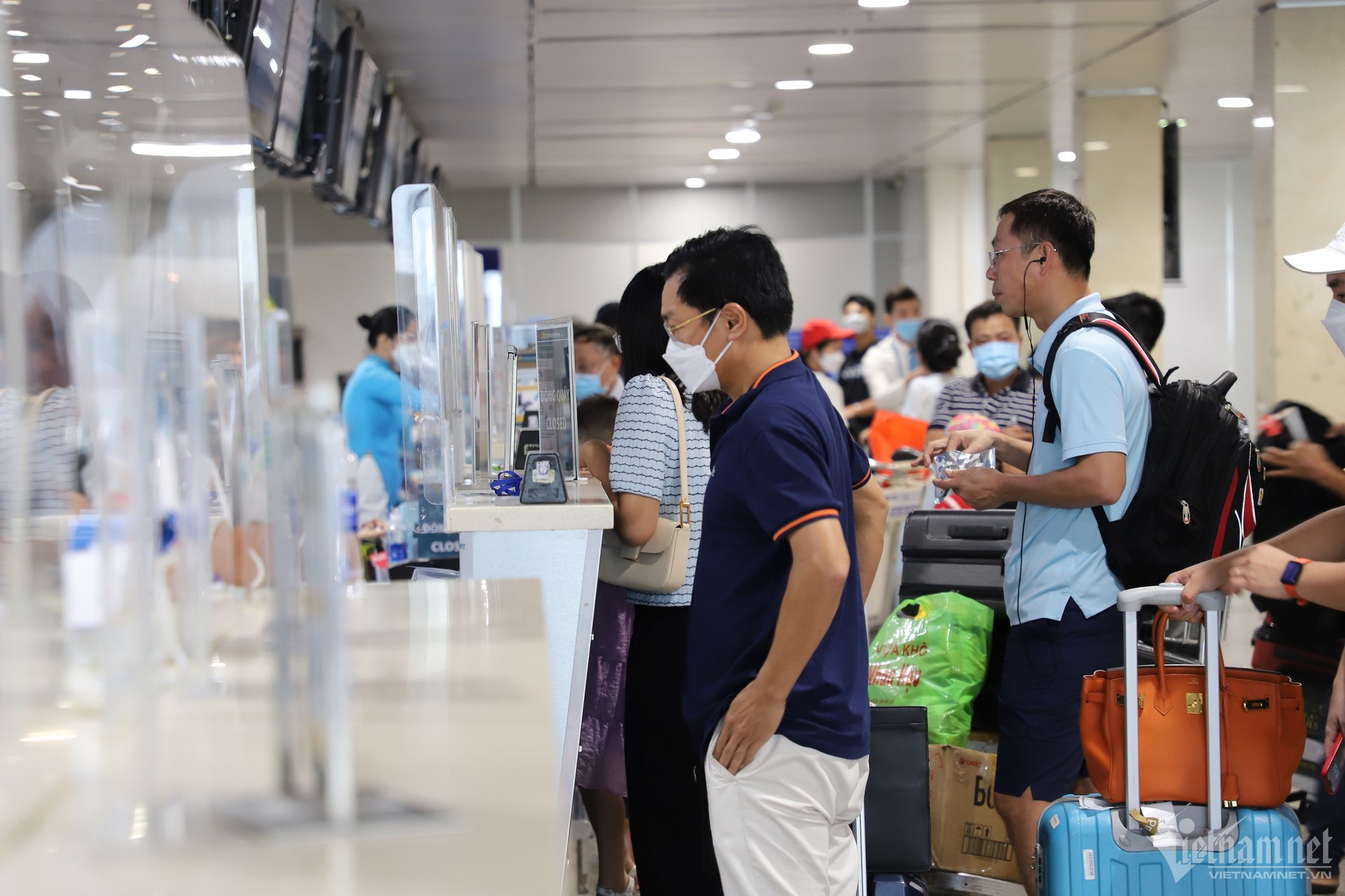 Cảnh báo ngập, chậm chuyến tăng cao dịp hè tại sân bay Tân Sơn Nhất - Ảnh 1.