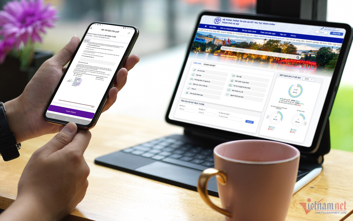 Người dân Hà Nội không phải trả phí khi dùng 82 dịch vụ công trực tuyến - Ảnh 1.