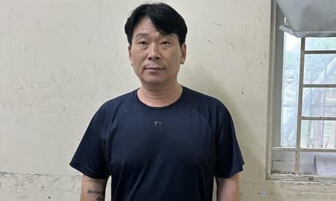 TP HCM: Một tội phạm bị Hàn Quốc truy nã ẩn náu ở chung cư quận 7 - Ảnh 1.
