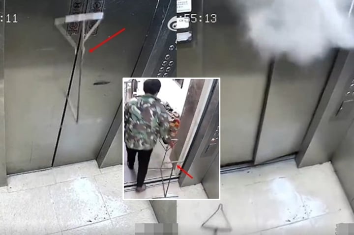 Thang máy phát nổ khi một phụ nữ cố chặn cửa bằng khung sắt - Ảnh 1.