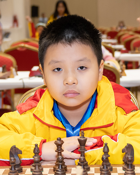 Kỳ thủ nhí học lớp 3 vô địch Giải cờ vua trẻ châu Á - Ảnh 1.