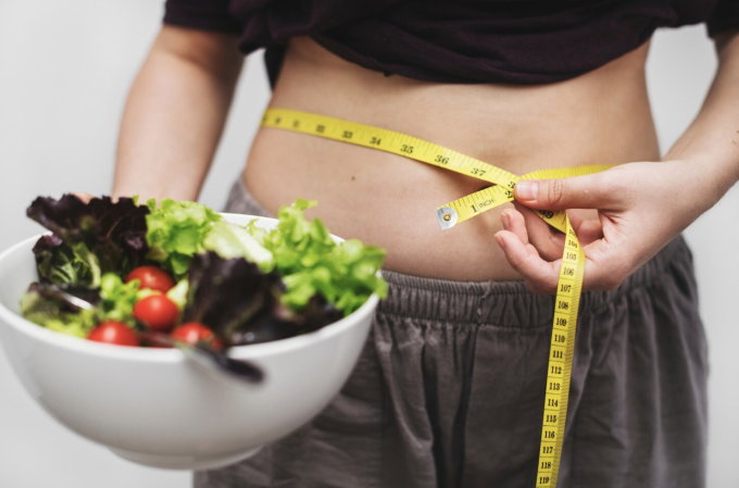 Chế độ ăn uống giảm cân sau Tết - Ảnh 1.
