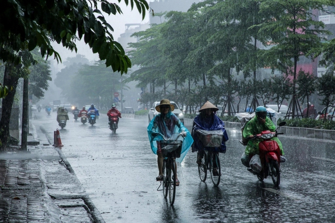 Không khí lạnh đang tràn xuống, miền Bắc mưa dông kéo dài - Ảnh 2.