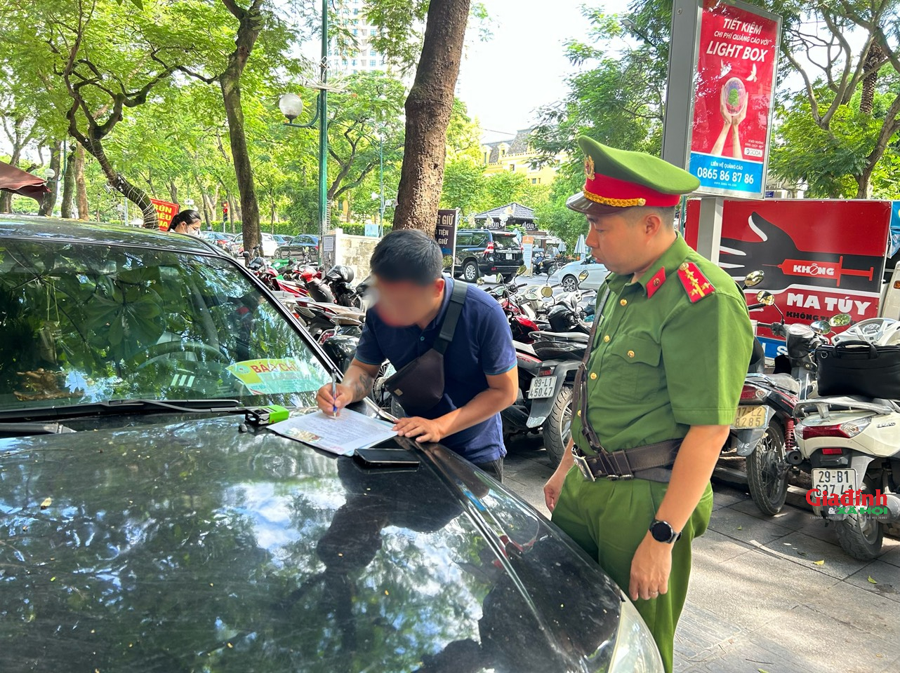 Công an phường Trần Hưng Đạo xử lý hàng loạt bãi xe không phép sau phản ánh của Gia đình và Xã hội- Ảnh 2.