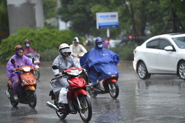 Miền Bắc mưa to trước khi không khí lạnh tràn về gây rét đậm - Ảnh 1.