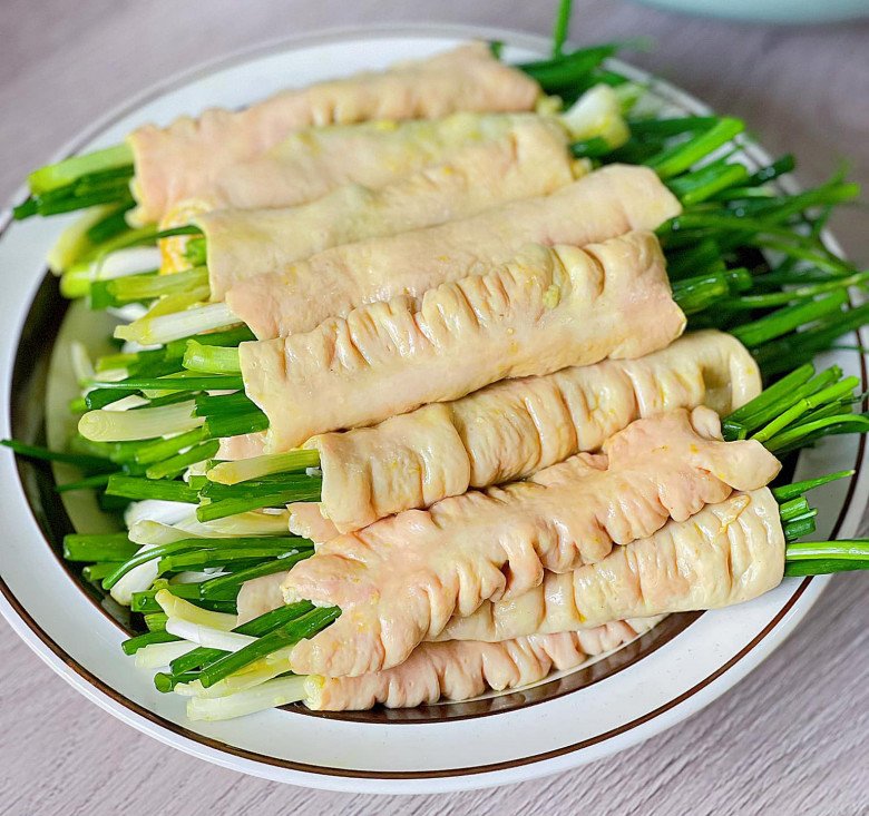 Cách làm khấu đuôi nhồi hành lá nướng thơm lừng, béo ngậy cho ông xã lai rai ngon đã miệng - Ảnh 6. Cách làm khấu đuôi nhồi hành lá nướng thơm lừng, béo ngậy cho ông xã lai rai ngon đã miệng - Ảnh 6.