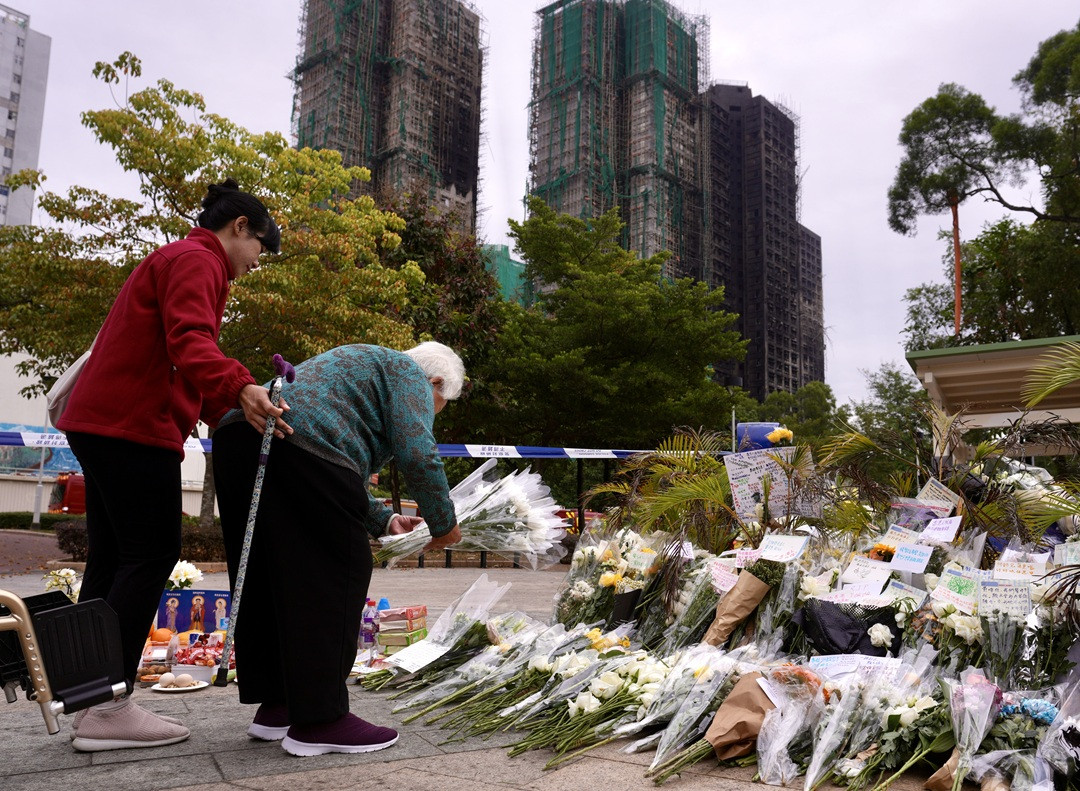 Số người thiệt mạng vì vụ cháy chung cư ở Hong Kong tăng lên 146 - Ảnh 2.