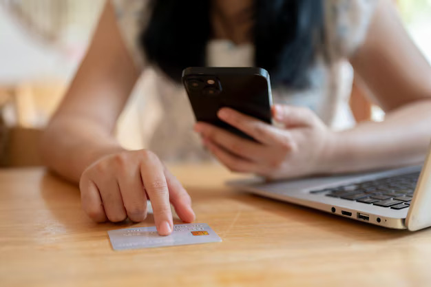 closeup-image-asian-woman-pointing-her-finger-credit-card-table67155-45731-1740407327036-1740407327157751013399-1740533406217-17405334066751790024060.jpg