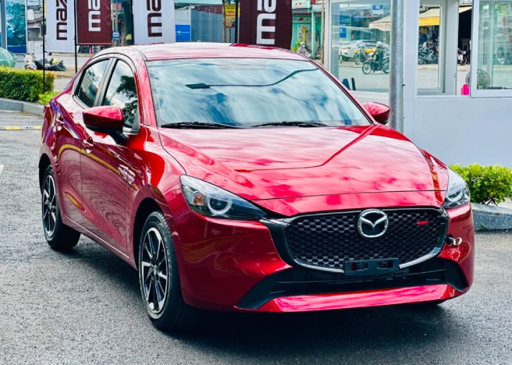 Xe sedan hạng B giá từ 386 triệu đồng: Hyundai Accent, Kia Soluto hay New Mazda2 đáng mua nhất?- Ảnh 2.