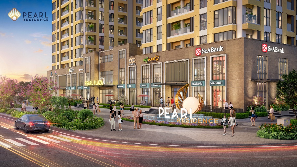 Đầu tư sinh lời bền vững tại tổ hợp căn hộ cao cấp Pearl Residence nơi viên ngọc xanh xứ Nghệ Cửa Lò- Ảnh 1. A group of people walking in front of a building Description automatically generated