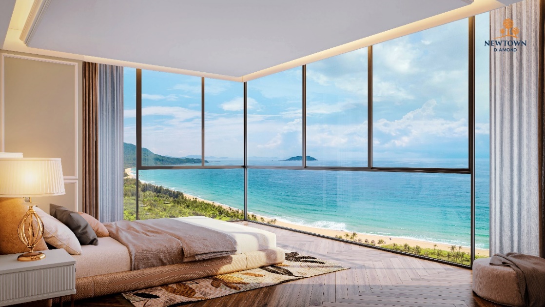 Newtown Diamond –Trải nghiệm không gian ngập tràn sắc xanh trên trục đại lộ kim cương Đà Nẵng- Ảnh 2. A room with a view of the ocean Description automatically generated