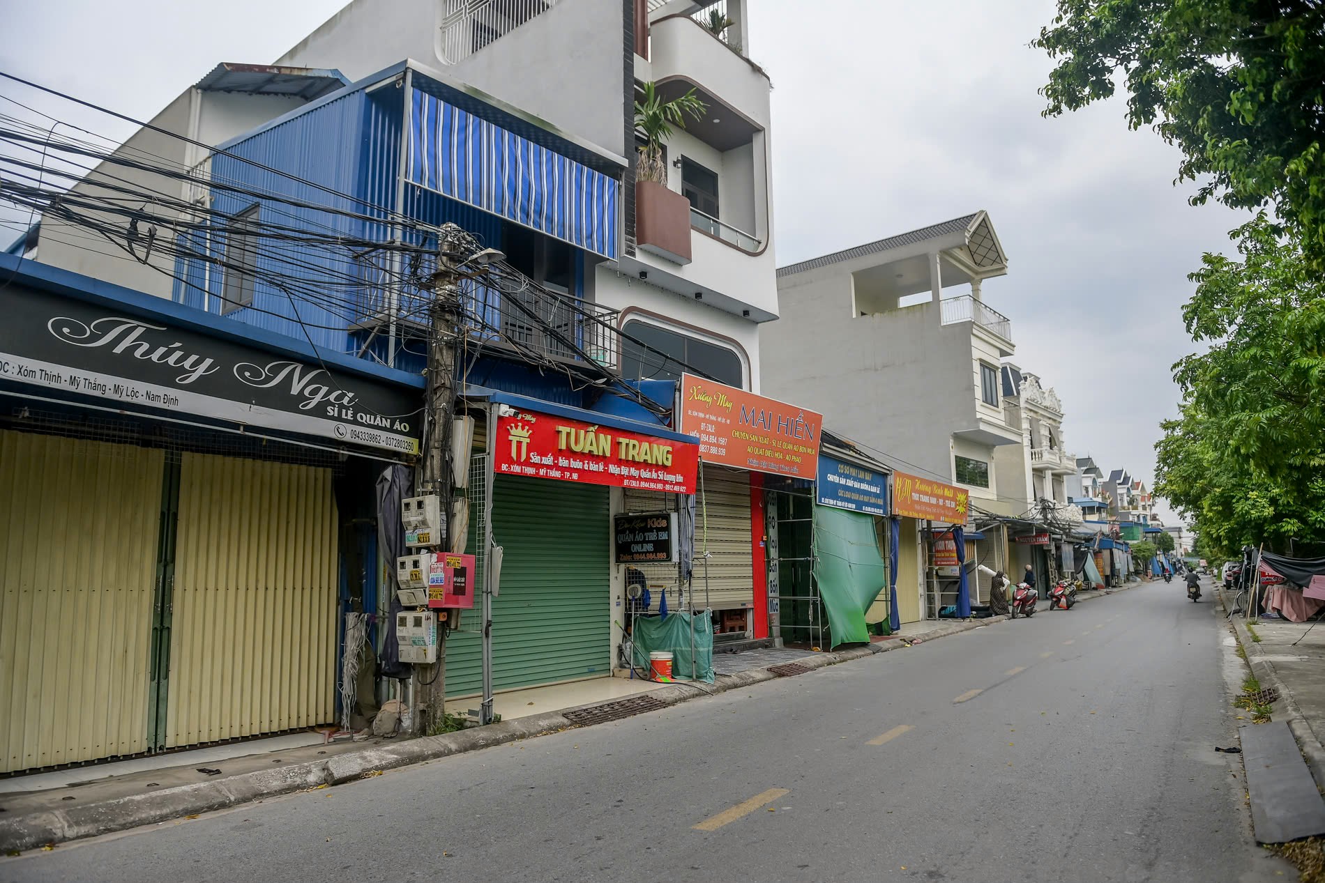 Nhiều cơ sở sản xuất hàng hóa may mặc tại một xã ở Nam Định bỗng nhiên đóng cửa, không khí ảm đạm- Ảnh 4. Nhiều cơ sở sản xuất hàng hóa may mặc tại một xã ở Nam Định bỗng nhiên đóng cửa, không khí ảm đạm- Ảnh 4.