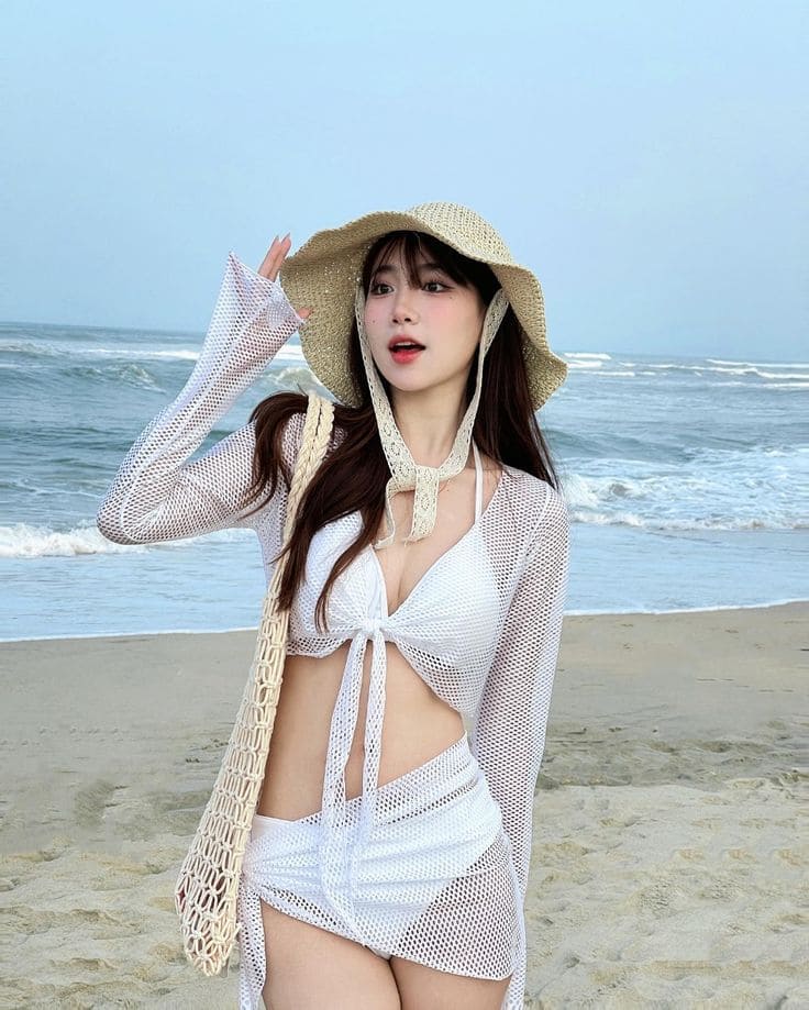 Gợi ý những mẫu thời trang đi biển quyến rũ, nhất định tham khảo lựa chọn trong mùa hè 2025- Ảnh 2. Gợi ý những mẫu thời trang đi biển quyến rũ, nhất định tham khảo lựa chọn trong mùa hè 2025- Ảnh 2.