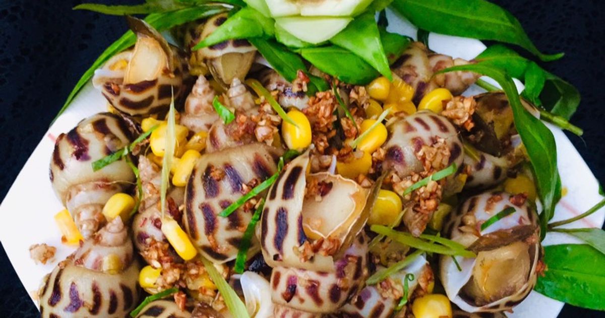 របៀបធ្វើខ្យងចៀនជាមួយប័រពោត - រូបថត ១. Cách làm ốc hương xào bơ bắp ăn là mê - Ảnh 1.