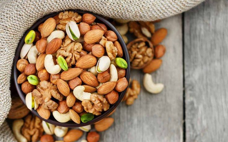 wooden-bowl-with-mixed-nuts-17586023423511728508140-125-0-585-736-crop-1758602363941283035512.jpeg
