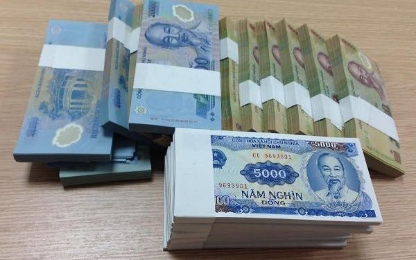 Thị trường đổi tiền lẻ trước Tết: Bảo vệ người ti&ecirc;u d&ugrave;ng khỏi ph&iacute; cao - Ảnh 1.