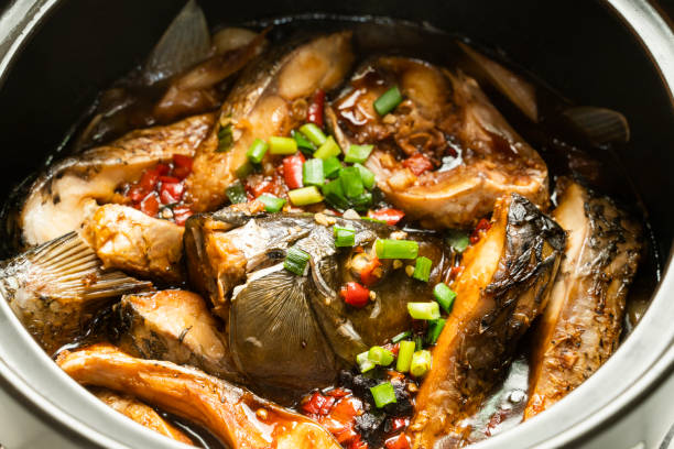 Mẹo kho cá thịt chắc xương nhừ: Thời gian ướp chuẩn và bí quyết chêm nước không bị tanh - Ảnh 9.