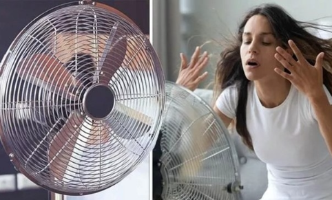 Bật quạt khi ngủ ban đ&ecirc;m: 4 nguy&ecirc;n tắc "v&agrave;ng" để kh&ocirc;ng bị ốm m&ugrave;a nắng n&oacute;ng - Ảnh 1.