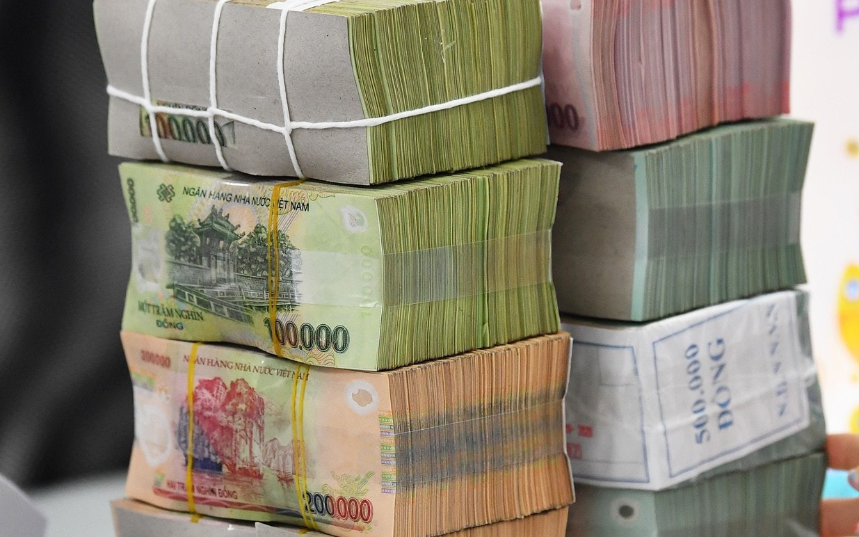 Bất ngờ số tiền về tay khi gửi tiết kiệm 100 triệu đồng 12 tháng - Ảnh 1.