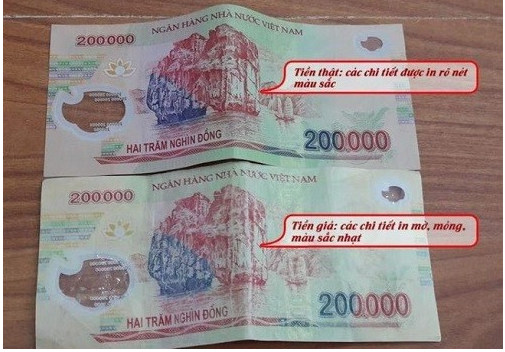 Dựa v&agrave;o những đặc điểm n&agrave;y c&oacute; thể dễ d&agrave;ng ph&acirc;n biệt được tiền giả - tiền thật - Ảnh 1.