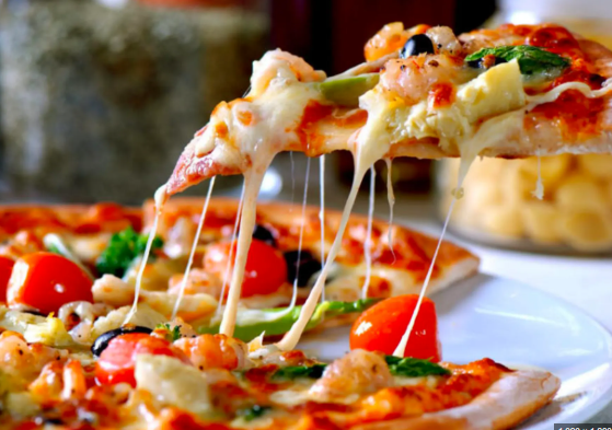 Sự thật về việc ăn pizza và hướng dẫn cách ăn tốt cho sức khỏe - Ảnh 1.