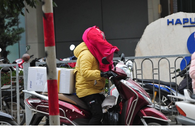 لباس های خاص هانوی در اولین روز ثبت هوای سرد - عکس 13.