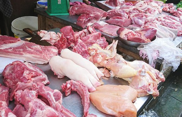 Giá thịt lợn tại Việt Nam đang thấp kỷ lục nhưng vẫn cao nhất thế giới? - Ảnh 2.