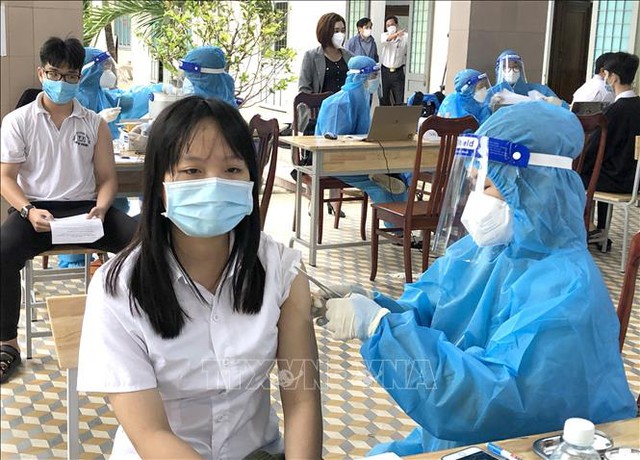 WHO khuyến cáo các yếu tố ứng phó với biến chủng Omicron ở Việt Nam - Ảnh 1.