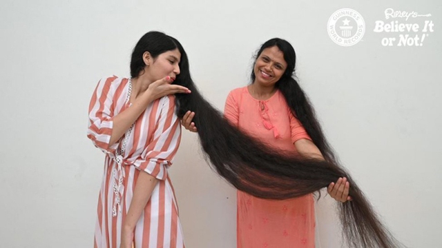 Thiếu nữ tóc dài nhất thế giới cắt ngắn sau 12 năm - Ảnh 2.