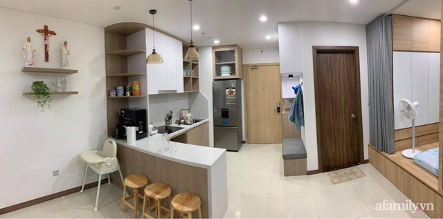 Căn hộ chỉ 55m² nhưng rất gọn gàng, hợp lý và đầy đủ mọi công năng của gia đình trẻ ở Sài Gòn - Ảnh 2.