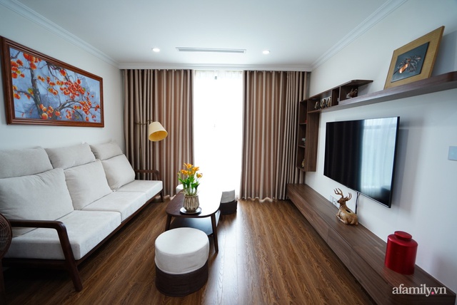 Căn hộ 107m² đẹp sang trọng với nội thất gỗ, chi phí hoàn thiện 150 triệu đồng ở Hà Nội - Ảnh 1.