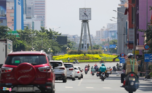 Đường phố TP.HCM ngày càng đông - Ảnh 5.