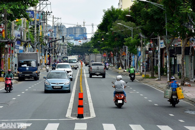 Quận đầu tiên ở TPHCM áp dụng thí điểm trạng thái bình thường mới - Ảnh 12.