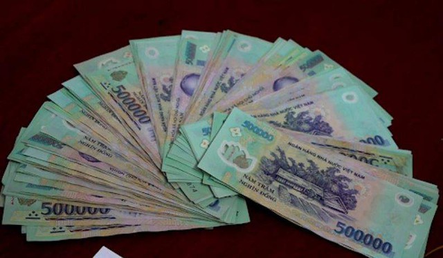 Tìm chủ nhân để quên 10 triệu đồng tại khe nhận tiền cây ATM - Ảnh 2.