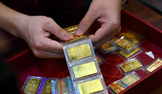 Giá vàng hôm nay 27/10: Vàng tăng dựng đứng, sát mốc 71 triệu đồng/lượng - Ảnh 2.