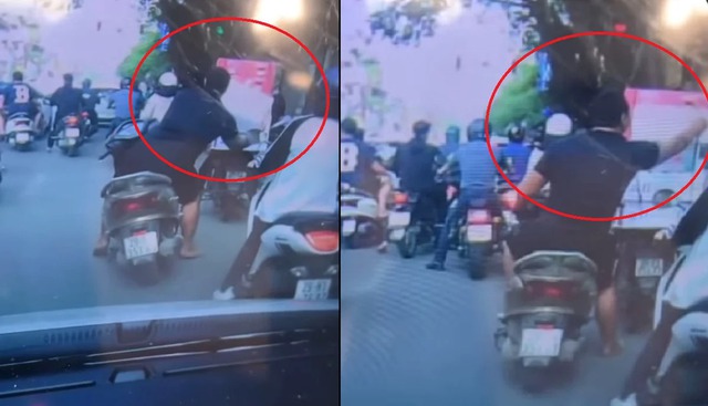 Video: Ngang nhiên trộm chim trên phố ở Hà Nội, người đàn ông cười tươi rói trước khi rời đi - Ảnh 2.