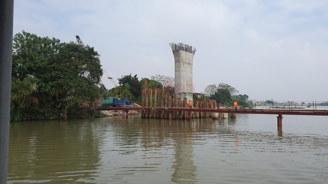 Ngày cuối cùng năm 2023, công nhân vẫn tất bật thi công cầu bắc qua sông lớn ở Nam Định - Ảnh 12.