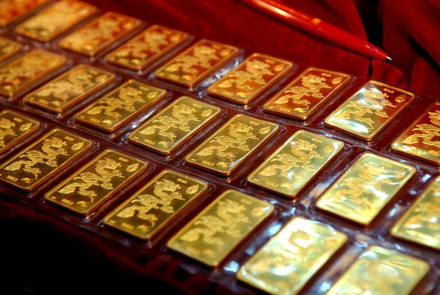 Giá vàng hôm nay 22/2: Vàng giảm giá mạnh, mua ngày Vía Thần tài lỗ tới 1,7 triệu/lượng - Ảnh 2.